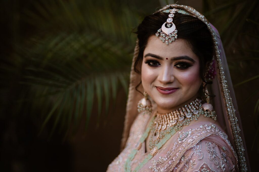 A beautiful bride in ornate traditional attire, exuding elegance and grace.